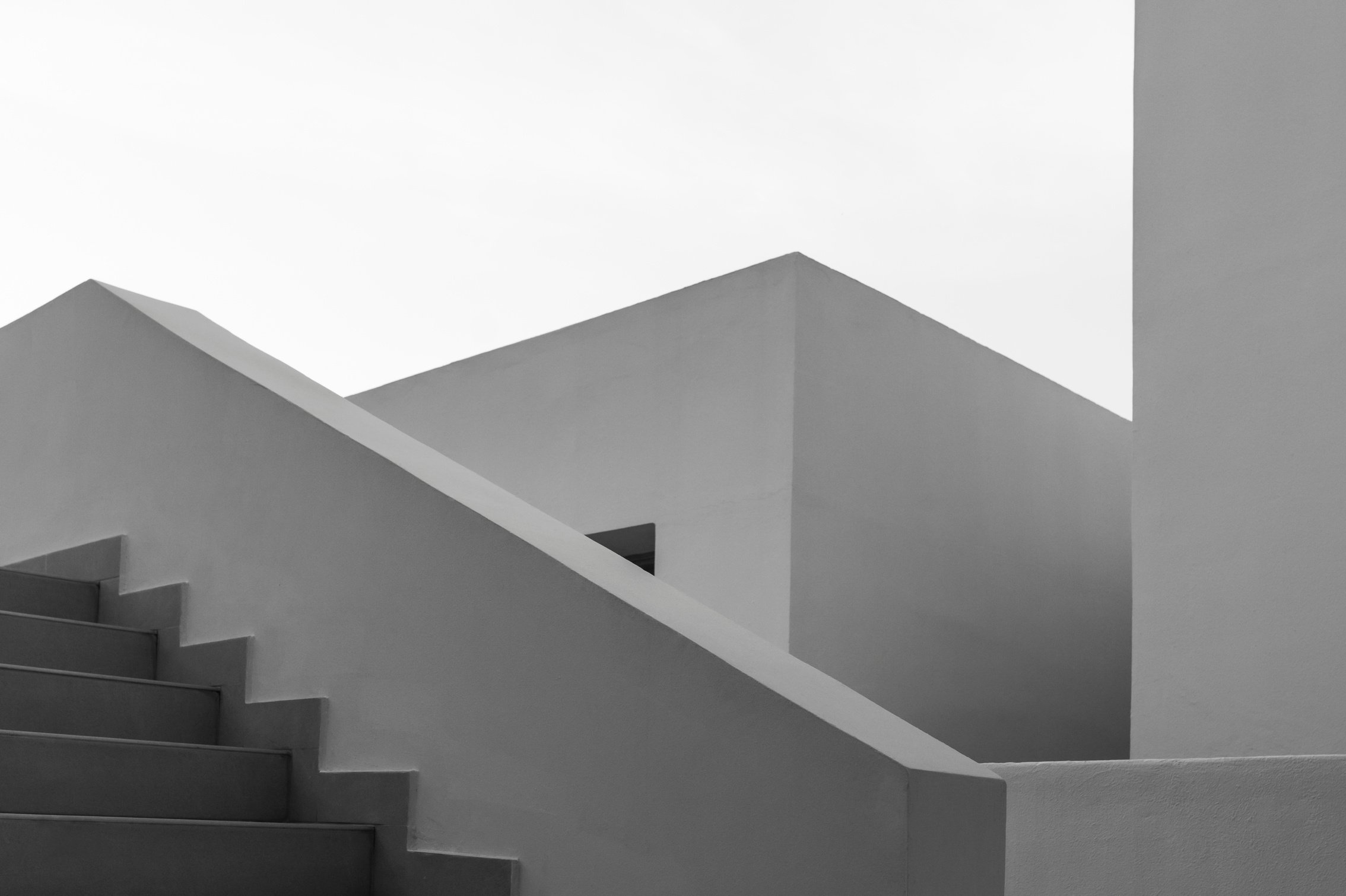 Minimalist monochrome geometric architecture.